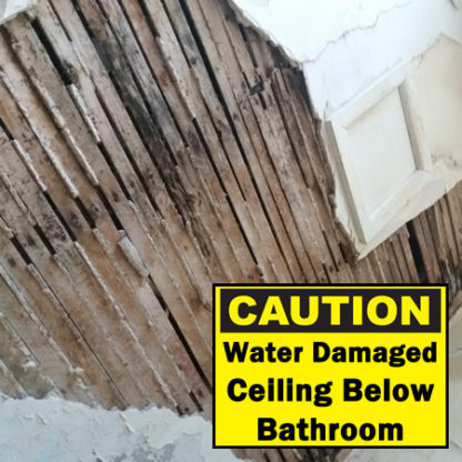 Water Damage to Ceiling Below the Bathroom